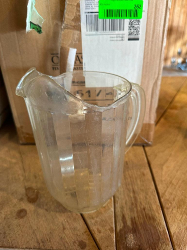 (4) 64 OZ PLASTIC PITCHERS.