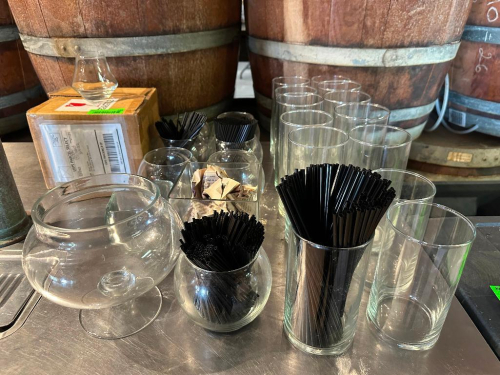 (1) LOT OF ASSORTED GLASS WARE AND BAR SUPPLIES.
