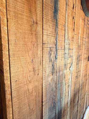 ALL CEDAR WALL PANELING IN LOWER BAR.