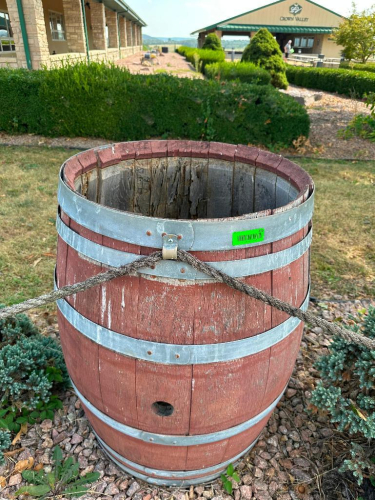 (2) WOOD WINE BARREL WITH RED-STAINED STAVE CONSTRUCTION, GALVANIZED METAL HOOPS, SOLID WOOD HEAD, AND SIDE BUNG.