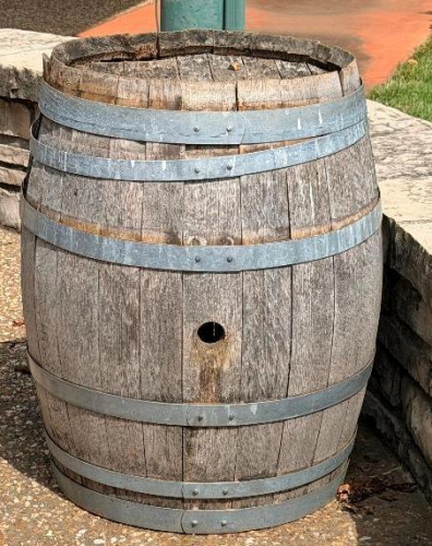 (4) WOOD WINE BARREL WITH RED-STAINED STAVE CONSTRUCTION, GALVANIZED METAL HOOPS, SOLID WOOD HEAD, AND SIDE BUNG.