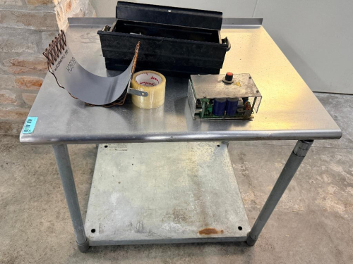 36" X 30" STAINLESS TABLE W/ 2" BACK SPLASH.