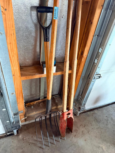 POST HOLE DIGGER AND PITCH FORK.