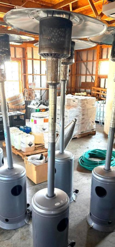 COMMERCIAL PROPANE PATIO HEATER WITH ROUND REFLECTOR, METAL BURNER ASSEMBLY, ADJUSTABLE HEAT CONTROL AND ENCLOSED PROPANE TANK BASE.