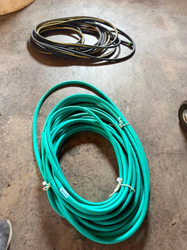 (2) GARDEN HOSES. 100' SECTION AND 50' SECTION
