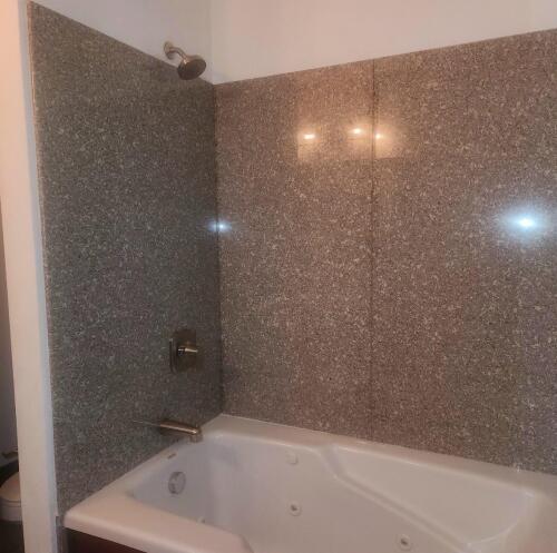 (4) 5' X 3' LARGE SPECKLED TUB/SHOWER GRANITE SURROUND