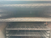 OLD HICKORY COMMERCIAL ROTISSERIE / BARBECUE OVEN WITH STAINLESS STEEL EXTERIOR, DOUBLE FRONT ACCESS DOORS, MULTIPLE INTERNAL COOKING RACKS, REAR FIREBOX ACCESS, ANALOG TEMPERATURE GAUGE, MANUAL TEMPERATURE CONTROL, INDICATOR LIGHTS, AND HEAVY-DUTY CASTER - 4