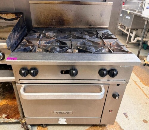 VULCAN 6-BURNER COMMERCIAL NATURAL GAS RANGE WITH CAST IRON OPEN-TOP BURNERS, HEAVY-DUTY CAST IRON GRATES, STAINLESS STEEL FRONT AND SIDES, REAR BACKSPLASH, AND STANDARD OVEN BASE WITH TWO INTERIOR OVEN RACKS