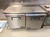 63" X 30" HEAVY DUTY STAINLESS TABLE.