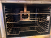 VULCAN DOUBLE-STACK COMMERCIAL CONVECTION OVEN WITH TWO INDEPENDENT OVEN COMPARTMENTS, STAINLESS STEEL EXTERIOR, DOUBLE GLASS VIEWING DOORS, ADJUSTABLE WIRE RACKS, FORCED-AIR CONVECTION FANS, INDIVIDUAL TEMPERATURE CONTROLS, TIMERS, AND MOBILE CASTER BASE - 4