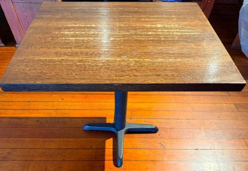 32" X 24" WOOD-TOP DINING TABLE WITH DARK STAINED FINISH AND SINGLE CENTER PEDESTAL BASE.