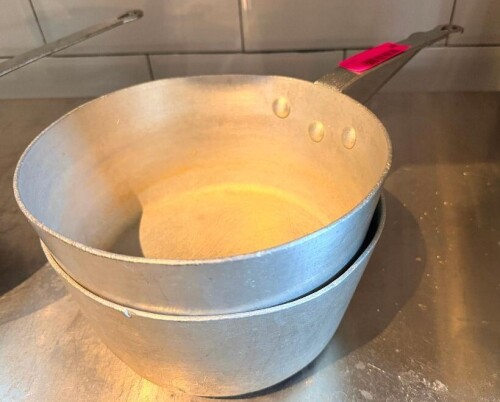 (2) 9" SAUCE POTS W/ HANDLES.