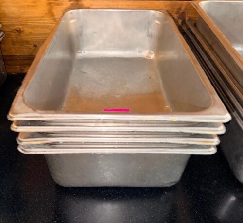 (4) FULL SIZE STAINLESS INSERTS.