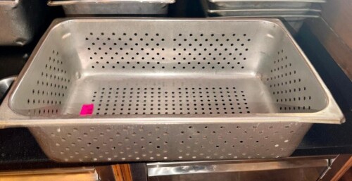 FULL SIZE SLOTTED STAINLESS INSERT.