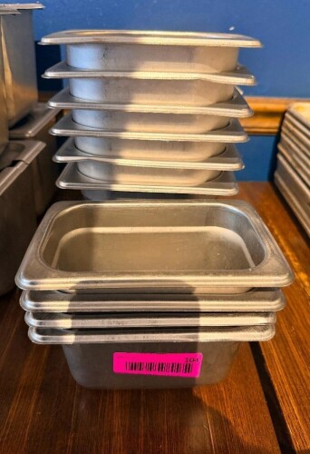 (12) 1/9 TH SIZE STAINLESS INSERTS.