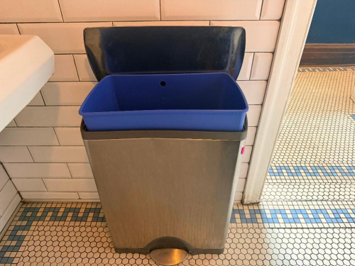 STAINLESS BATHROOM TRASH CAN W/ FOOT PEDAL AND PLASTIC INSERT