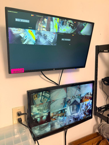 (2) 20" MONITORS W/ WALL MOUNTS.