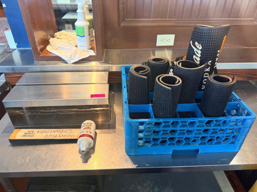 (1) LOT OF ASSORTED BAR SUPPLIES AND MATS.