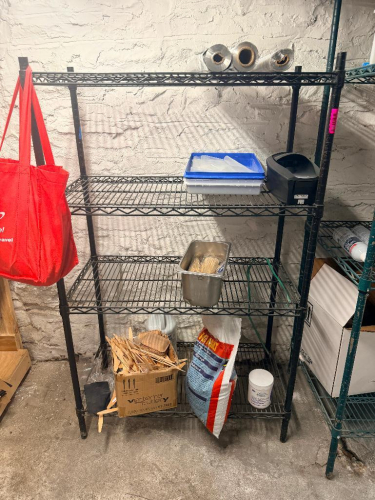 36" X 18" FOUR TIER BLACK WIRE SHELF.