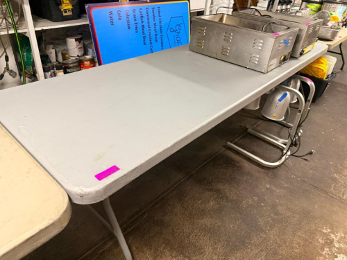 8' FOLDING BANQUET TABLE. ( CONTENTS ARE NOT INCLUDED. )