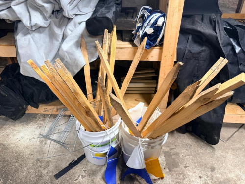 (2) BUCKETS OF WOODEN YARD STAKES.