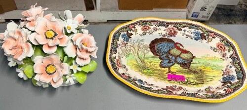 HAND-PAINTED SPODE TURKEY SERVING PLATTER FEATURING A CENTRAL GAME BIRD DESIGN SURROUNDED BY THE BRITISH FLOWERS BORDER ON THE TRADITIONAL GADROON-SHAPED EDGE. MULTICOLOR FLORAL BORDER WITH YELLOW ACCENT RIM. ALSO INCLUDES DECORATIVE PORCELAIN FLORAL ARRA