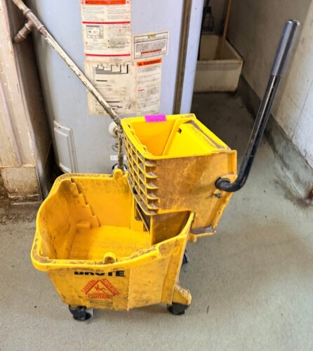 YELLOW PLASTIC MOP BUCKET AND WRINGER
