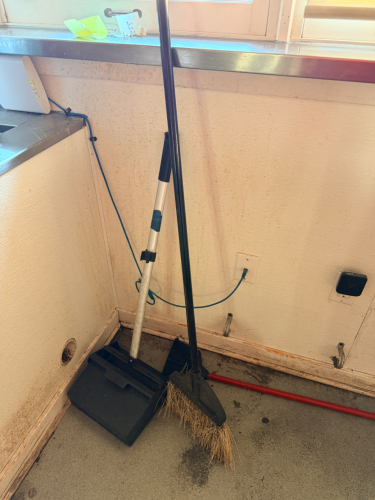 (1) LOT OF CLEANING SUPPLIES AND (2) SMALL DRY ERASE BOARDS.