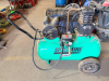 SPEEDAIRE PORTABLE HORIZONTAL ELECTRIC AIR COMPRESSOR WITH 20-GALLON AIR RECEIVER, OIL-LUBRICATED BELT-DRIVE PUMP, PRESSURE SWITCH, REGULATOR, PRESSURE GAUGE, BELT GUARD, WHEELS, AND HANDLE.