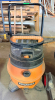 RIDGID HEAVY-DUTY WET/DRY SHOP VACUUM WITH 16-GALLON COLLECTION TANK, 6.5 PEAK HP MOTOR, SCROLL NOISE REDUCTION SYSTEM, LARGE REAR WHEELS, FRONT CASTERS, PUSH HANDLE, AND LOWER TANK DRAIN.