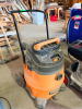 RIDGID HEAVY-DUTY WET/DRY SHOP VACUUM WITH 16-GALLON COLLECTION TANK, 6.5 PEAK HP MOTOR, SCROLL NOISE REDUCTION SYSTEM, LARGE REAR WHEELS, FRONT CASTERS, PUSH HANDLE, AND LOWER TANK DRAIN. - 3