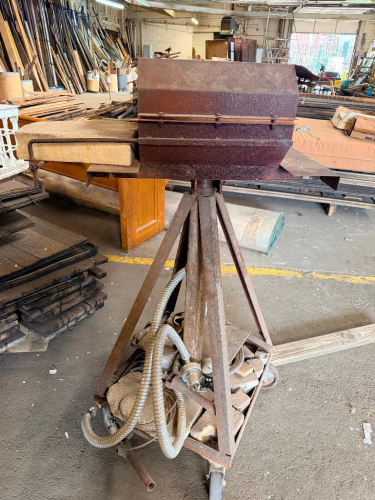 INDUSTRIAL PEDESTAL-MOUNTED ELECTRIC FORGE / HEAT TREATING FURNACE WITH INSULATED HEATING CHAMBER, FRONT WORK SHELF, METAL ENCLOSURE, AND FABRICATED STEEL STAND WITH CASTERS.