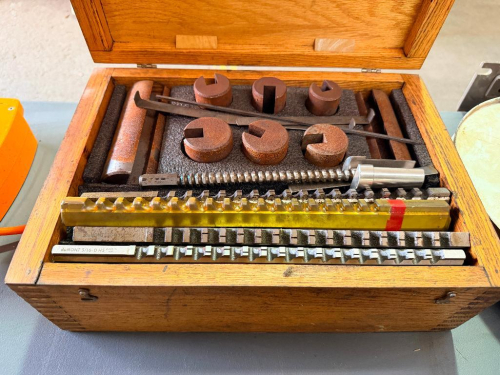 DUMONT MINUTE MAN KEYWAY BROACH SET WITH MULTIPLE KEYWAY BROACHES, SLOTTED GUIDE BUSHINGS, SHIMS, AND FITTED WOODEN STORAGE CASE.