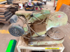 HEAVY-DUTY ABRASIVE CUT-OFF SAW WITH BELT-DRIVEN ELECTRIC MOTOR, ENCLOSED BLADE GUARD, PIVOTING CUTTING HEAD, ROUND WORK TABLE AND MATERIAL VISE / CLAMP ASSEMBLY. MOUNTED ON STEEL ROLLING STAND.