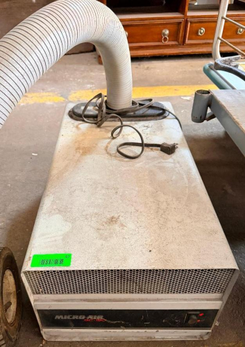 PORTABLE AIR FILTRATION / DUST COLLECTION UNIT WITH METAL HOUSING, FRONT INTAKE GRILLE, FLEXIBLE DUST COLLECTION HOSE AND ELECTRIC MOTOR/BLOWER ASSEMBLY.