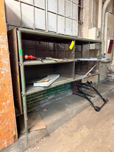 (1) 8' CUSTOM BUILT METAL PARTS SHELF AND (1) 20' CUSTOM BUILT PARTS SHELF.