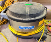 EUROCLEAN COMMERCIAL CANISTER VACUUM / DUST EXTRACTOR WITH STAINLESS STEEL COLLECTION CANISTER, TOP-MOUNTED MOTOR HOUSING, POWER CORD, AND CASTER BASE.