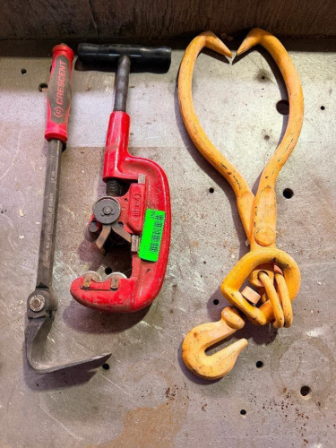 ASSORTED HAND TOOLS INCLUDING RIDGID TUBING / PIPE CUTTER, CRESCENT PRY BAR, AND HEAVY-DUTY LIFTING / LOG TONGS WITH SWIVEL HOOK ASSEMBLY.