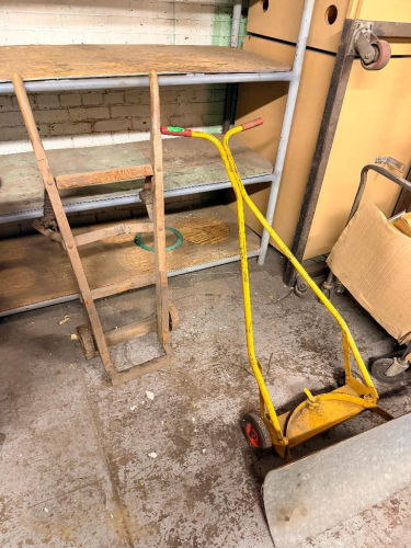 BARREL DOLLY AND WHEELED SNOW SHOVEL.