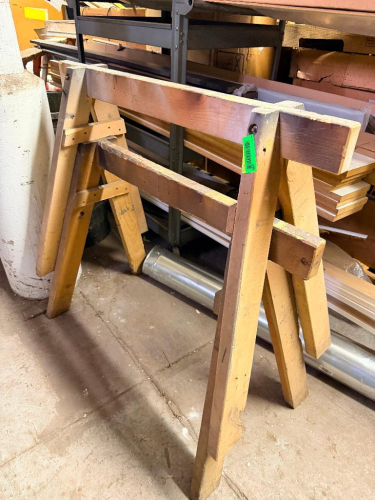 (2) WOODEN SAW HORSE STANDS.
