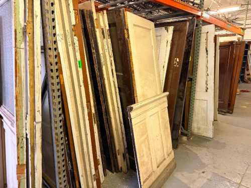 (1) LOT OF ASSORTED RECLAIMED VINTAGE DOORS. PALLET RACKING IS NOT INCLUDED.
