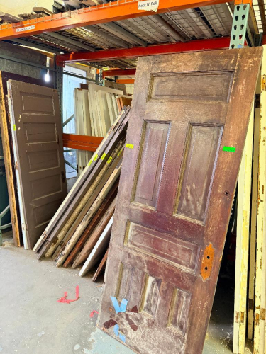 (1) LOT OF ASSORTED RECLAIMED VINTAGE DOORS. PALLET RACKING IS NOT INCLUDED.