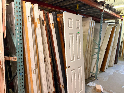 (1) LOT OF ASSORTED RECLAIMED VINTAGE DOORS. PALLET RACKING IS NOT INCLUDED.