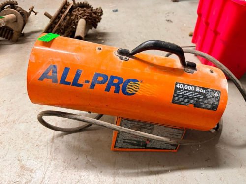 ALL-PRO PORTABLE FORCED-AIR PROPANE HEATER WITH STEEL CYLINDRICAL HOUSING, CARRY HANDLE, INTEGRATED FAN AND PROPANE SUPPLY HOSE.