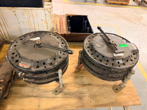 (6) VINTAGE CUTLER-HAMMER MANUAL MOTOR CONTROLLERS / DRUM SWITCHES WITH ROUND VENTED METAL ENCLOSURES, OPERATING HANDLES AND MOUNTING BRACKETS.