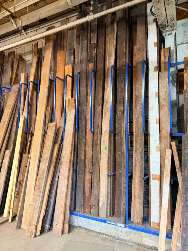 CONTENTS OF RACK - RECLAIMED LUMBER - ASSORTED SIZES, SPECIES, AND COLOR.