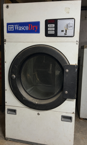 WASCODRY COMMERCIAL COIN-OPERATED FRONT-LOAD TUMBLE DRYER WITH LARGE CAPACITY DRUM, DIGITAL TIMER DISPLAY, COIN ACCEPTOR, AND HIGH TEMP, LOW TEMP, AND PERMANENT PRESS DRYING SETTINGS.