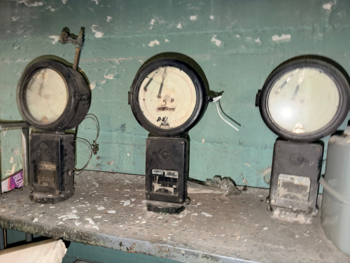 (3) VINTAGE GAS METERS.