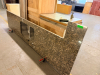 12' GRANITE COUNTERTOP WITH UNDERMOUNT DOUBLE-BOWL STAINLESS STEEL SINK, POLISHED FRONT EDGE, FAUCET/ACCESSORY CUTOUTS, AND MATCHING GRANITE END SECTION.