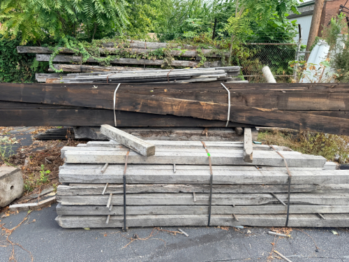 (3) STACKS / BUNDLES OF RECLAIMED LUMBER AND LARGE BEAMS.